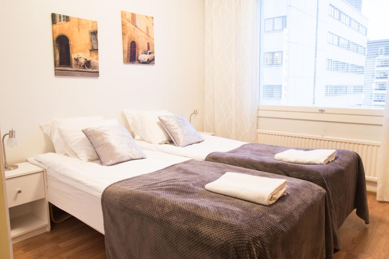 Apartment Hotel Tampere Mn Bagian luar foto